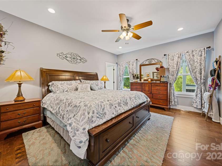 156 Olivet Lane, Fletcher, NC 28732.  MLS# CAR4272204, YatesRealty ID 21590. Step into your spacious primary bedroom