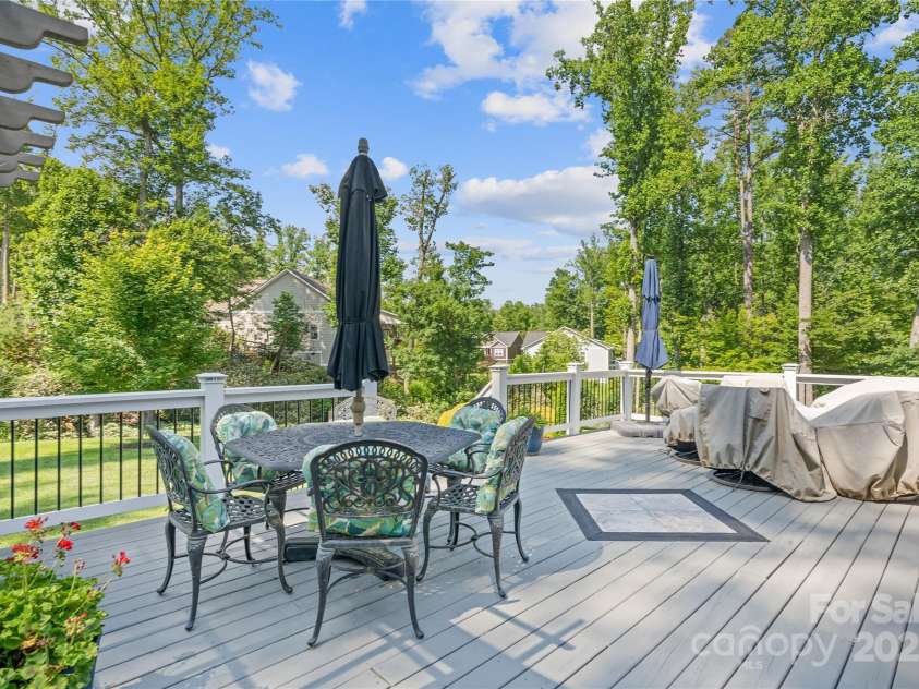 156 Olivet Lane, Fletcher, NC 28732.  MLS# CAR4272204, YatesRealty ID 21590. View one of back deck