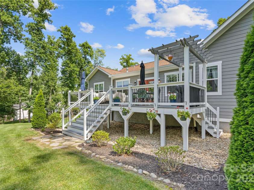 156 Olivet Lane, Fletcher, NC 28732.  MLS# CAR4272204, YatesRealty ID 21590. View showing both stairways off the deck