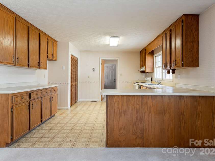 261 Lower Christ School Road, Fletcher, NC 28732.  MLS# CAR4201835, YatesRealty ID 21592. 