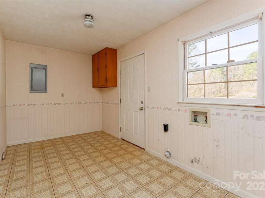 261 Lower Christ School Road, Fletcher, NC 28732.  MLS# CAR4201835, YatesRealty ID 21592. 