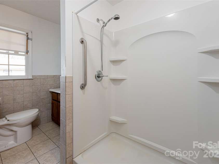 261 Lower Christ School Road, Fletcher, NC 28732.  MLS# CAR4201835, YatesRealty ID 21592. 