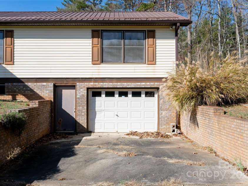 261 Lower Christ School Road, Fletcher, NC 28732.  MLS# CAR4201835, YatesRealty ID 21592. 