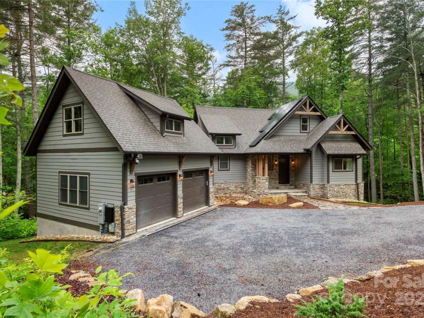 68 Huckleberry Ridge Lane, Zirconia, NC 28790.  MLS# CAR4265431, YatesRealty ID 21593. Solar on Roof