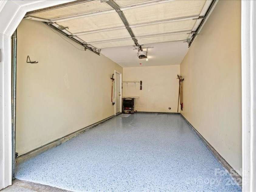 10063 Reindeer Way Lane, Charlotte, NC 28216.  MLS# CAR4265964, YatesRealty ID 21596. Beautiful epoxy garage floor-freshly done!
