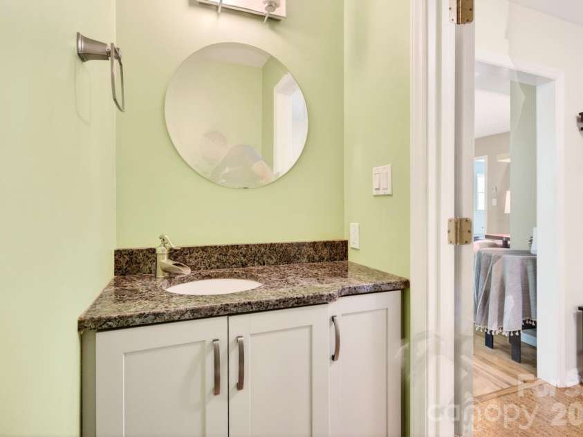 3 Crooked Creek Drive, Asheville, NC 28804.  MLS# CAR4376742, YatesRealty ID 21597. Half bath on main