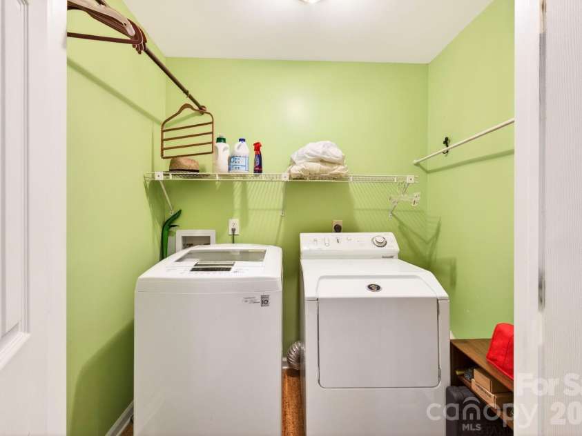 3 Crooked Creek Drive, Asheville, NC 28804.  MLS# CAR4376742, YatesRealty ID 21597. Oversized main level laundry closet