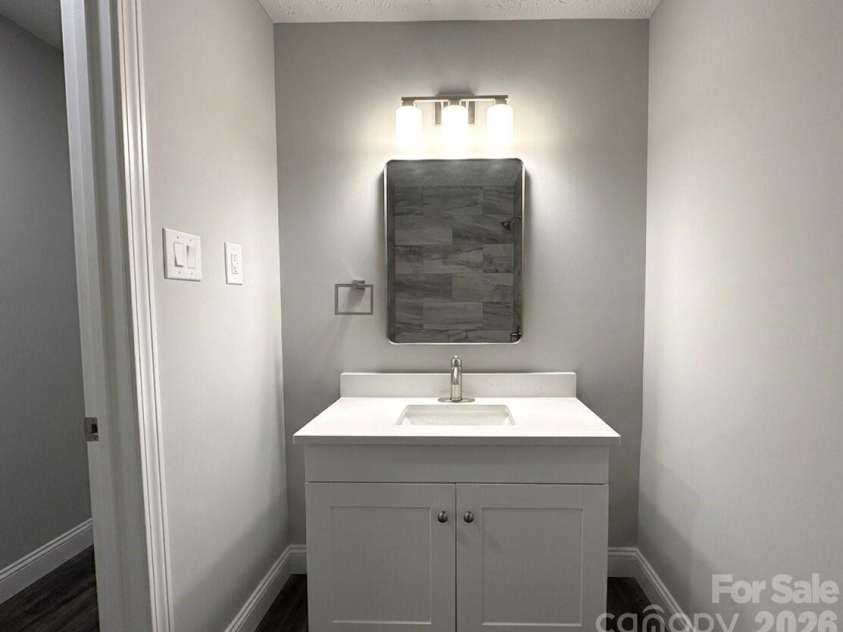 1200 Weststone Drive, Charlotte, NC 28208.  MLS# CAR4366441, YatesRealty ID 21602. Hall Bathroom