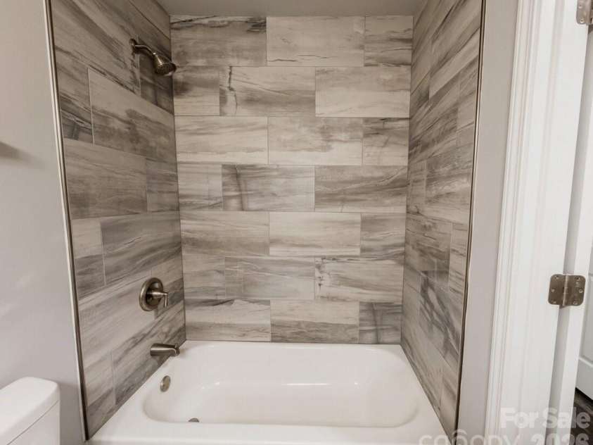 1200 Weststone Drive, Charlotte, NC 28208.  MLS# CAR4366441, YatesRealty ID 21602. Hall Bathroom