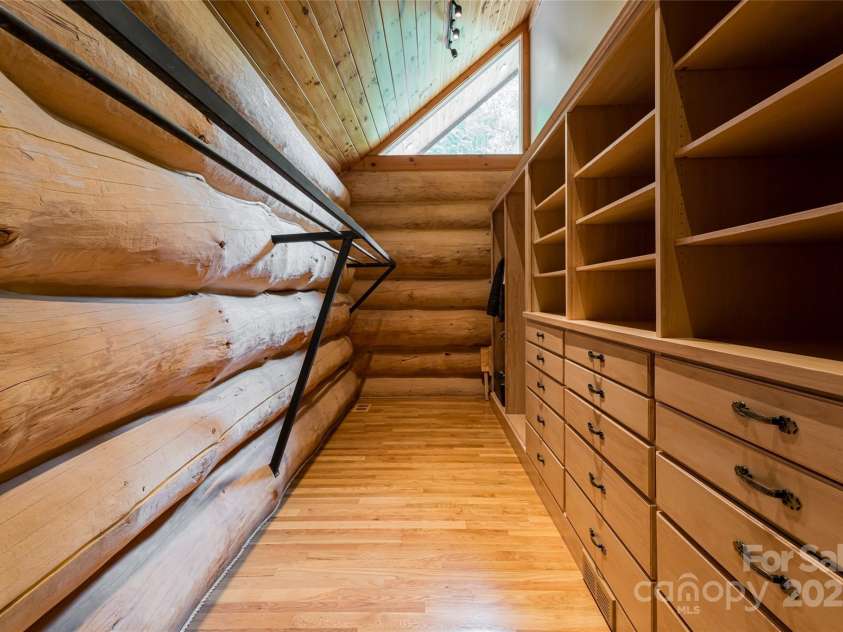 303 Flying Hawk Trail, Waynesville, NC 28786.  MLS# CAR4272138, YatesRealty ID 21603. This enormous primary closet is virtually it's own room!