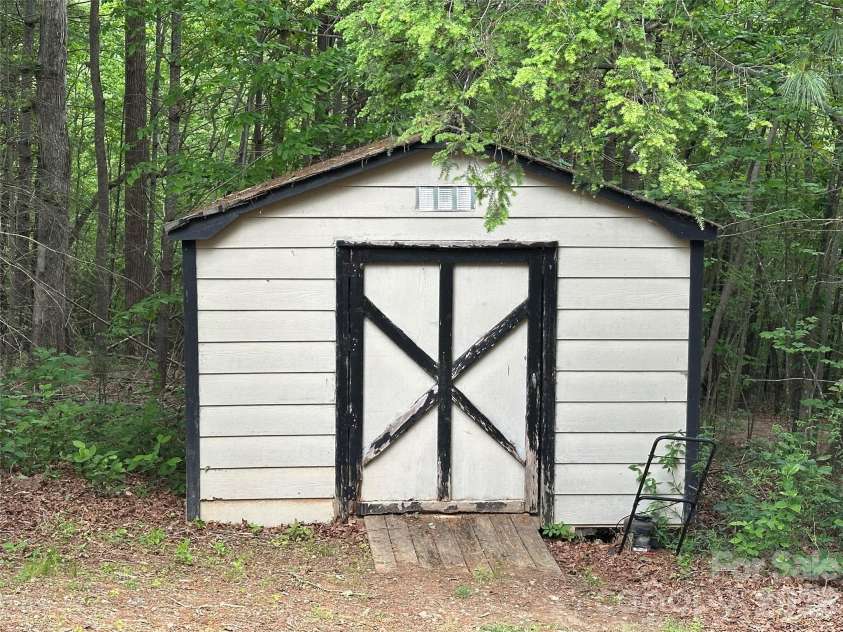 2495 Melvin Propst Drive, Morganton, NC 28655.  MLS# CAR4380122, YatesRealty ID 21604. 12x16 Storage Building