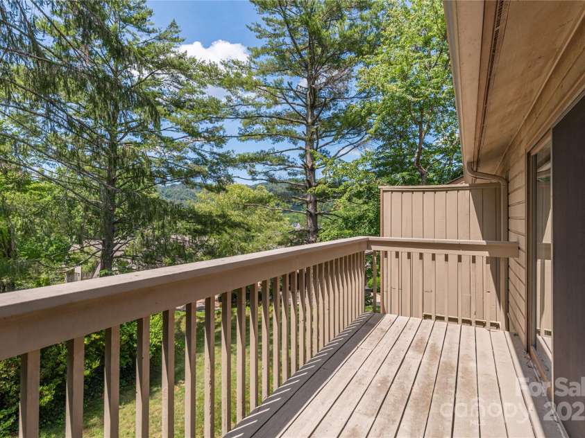 1101 Timber Trail, Asheville, NC 28804.  MLS# CAR4264560, YatesRealty ID 21606. Deck off Primary Bed