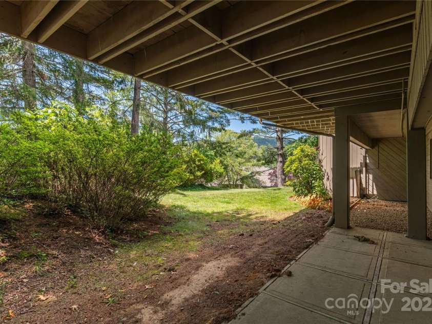 1101 Timber Trail, Asheville, NC 28804.  MLS# CAR4264560, YatesRealty ID 21606. Patio opens from Bedroom 2