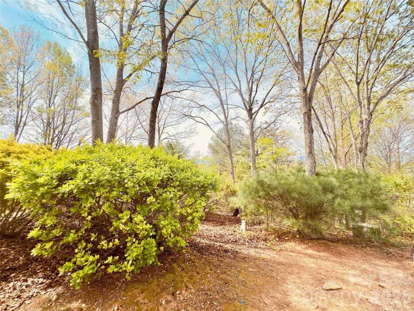 27 Magnolia Drive, Nebo, NC 28761.  MLS# CAR4367003, YatesRealty ID 21617. Additional rear lot included