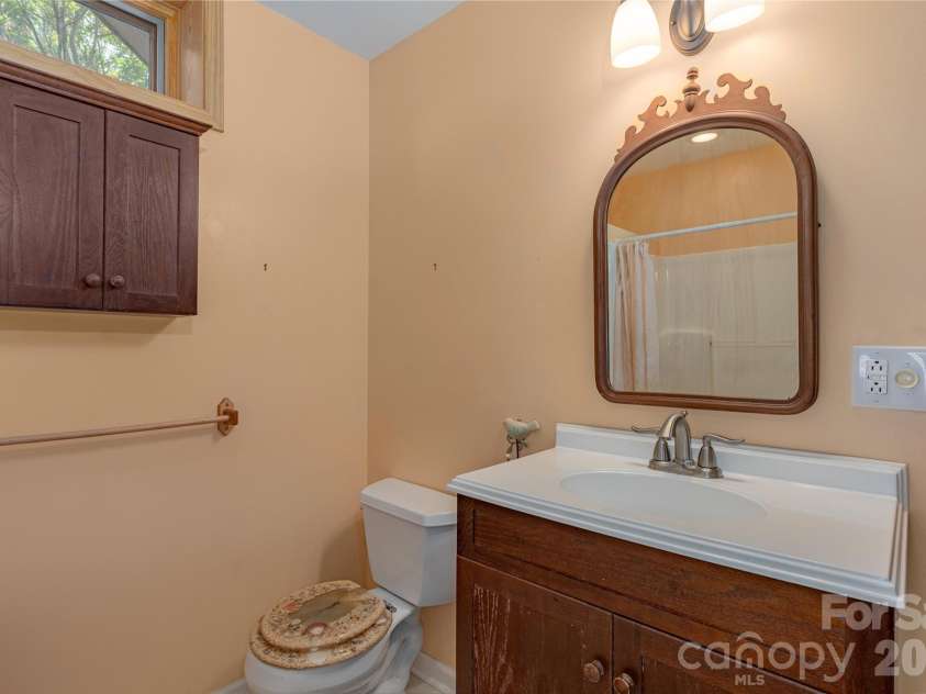 27 Magnolia Drive, Nebo, NC 28761.  MLS# CAR4367003, YatesRealty ID 21617. Lower level bathroom