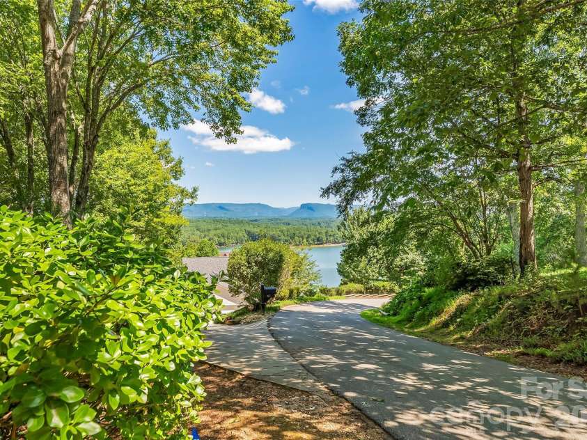 27 Magnolia Drive, Nebo, NC 28761.  MLS# CAR4367003, YatesRealty ID 21617. Street scene
