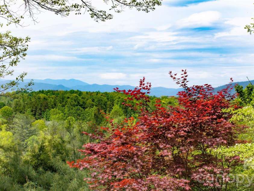 27 Magnolia Drive, Nebo, NC 28761.  MLS# CAR4367003, YatesRealty ID 21617. Views from deck