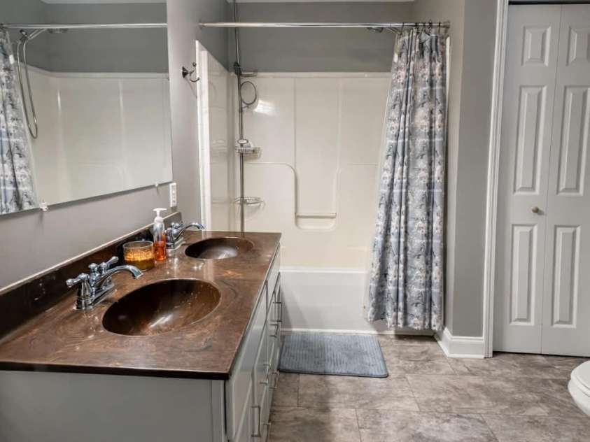 25 Eastwind Lane, Candler, NC 28715.  MLS# CAR4367557, YatesRealty ID 21619. 1st floor bathroom