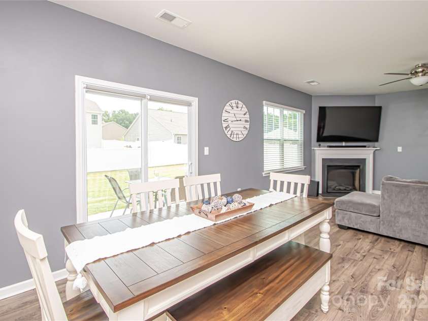 128 Hickory Ridge Drive, Locust, NC 28097.  MLS# CAR4270614, YatesRealty ID 21621. Dinning area is big enough to sit 8 people
