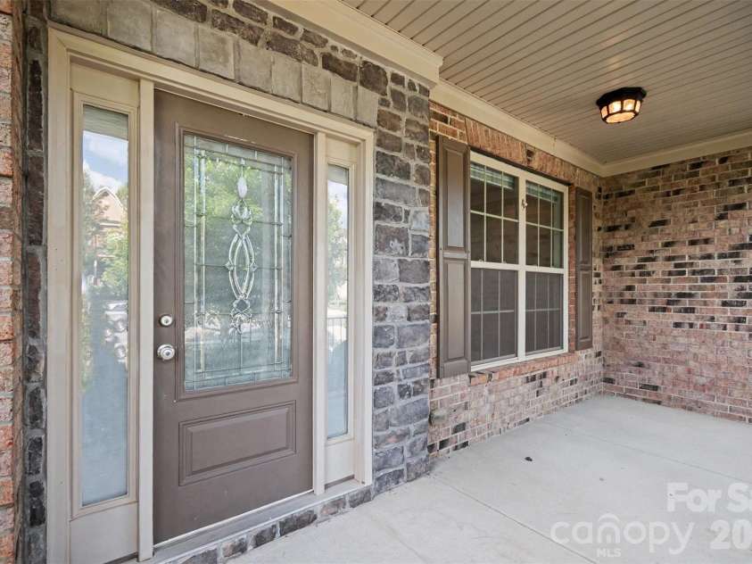 4016 Widgeon Way, Waxhaw, NC 28173.  MLS# CAR4394408, YatesRealty ID 21621. Covered front porch