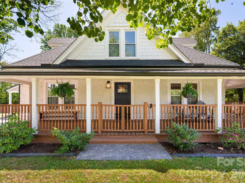 19 Neely Road, Brevard, NC 28712.  MLS# CAR4374359, YatesRealty ID 21627. Covered front porch