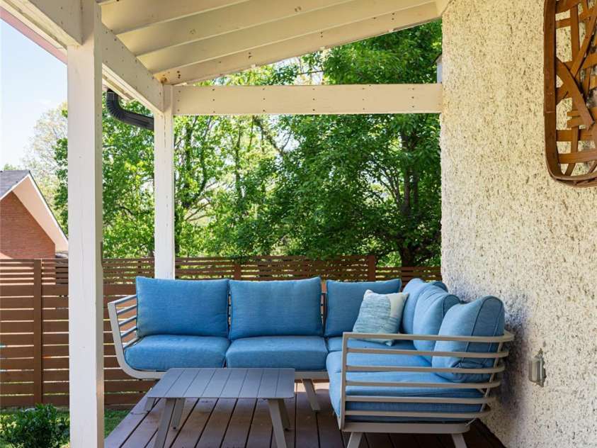 19 Neely Road, Brevard, NC 28712.  MLS# CAR4374359, YatesRealty ID 21627. Covered porch off garage