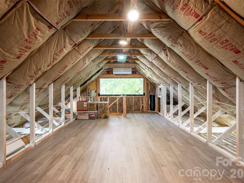 19 Neely Road, Brevard, NC 28712.  MLS# CAR4374359, YatesRealty ID 21627. Detached Garage Loft Space