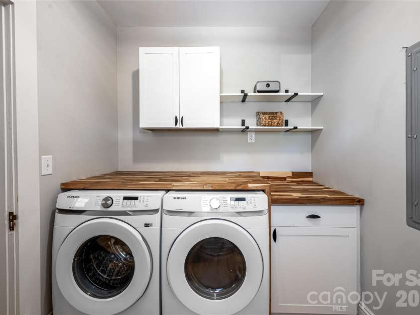 19 Neely Road, Brevard, NC 28712.  MLS# CAR4374359, YatesRealty ID 21627. Laundry on main