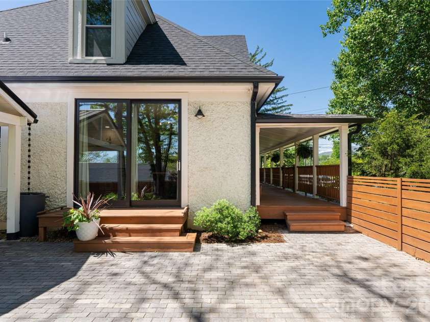 19 Neely Road, Brevard, NC 28712.  MLS# CAR4374359, YatesRealty ID 21627. Patio off dining area