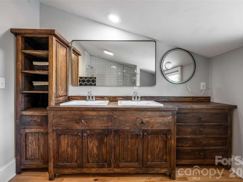 19 Neely Road, Brevard, NC 28712.  MLS# CAR4374359, YatesRealty ID 21627. Primary ensuite dual vanities