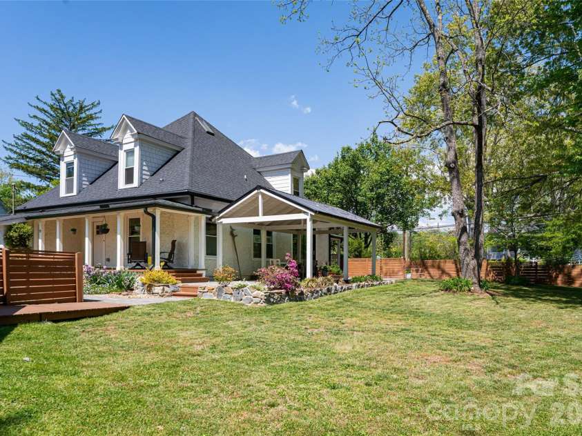 19 Neely Road, Brevard, NC 28712.  MLS# CAR4374359, YatesRealty ID 21627. Side Yard From Garage