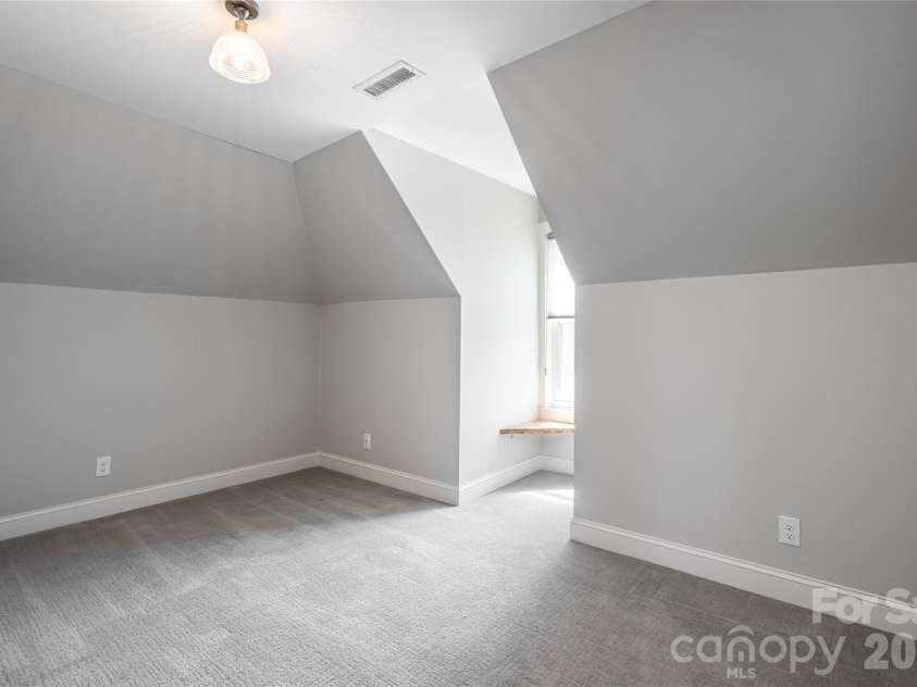 19 Neely Road, Brevard, NC 28712.  MLS# CAR4374359, YatesRealty ID 21627. Upper guest bedroom 3