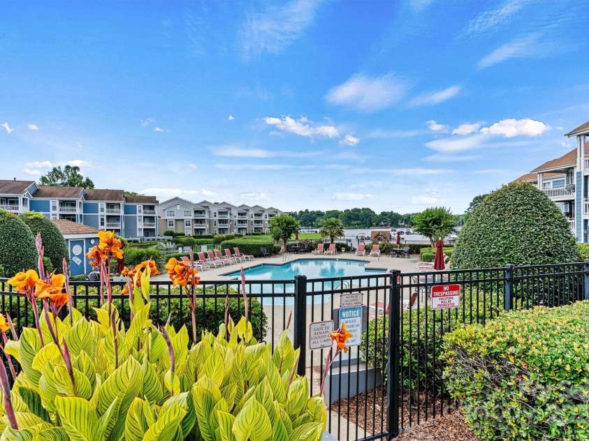1038 Southwest Drive, Davidson, NC 28036.  MLS# CAR4268495, YatesRealty ID 21629. Community pool