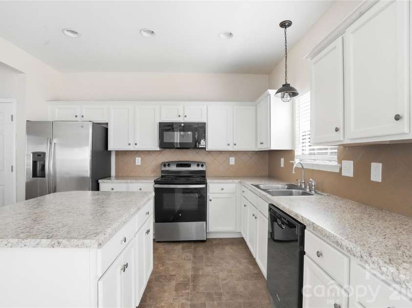 720 Yvonne Drive, Concord, NC 28027.  MLS# CAR4380147, YatesRealty ID 21629. 