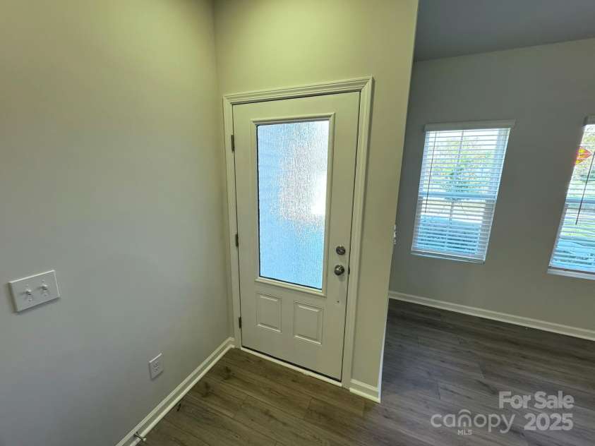 4750 Lakeview Road, Charlotte, NC 28216.  MLS# CAR4261325, YatesRealty ID 2164. Decorative Front Door, faces North
