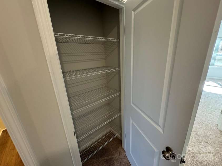4750 Lakeview Road, Charlotte, NC 28216.  MLS# CAR4261325, YatesRealty ID 2164. Hall Linen Closet