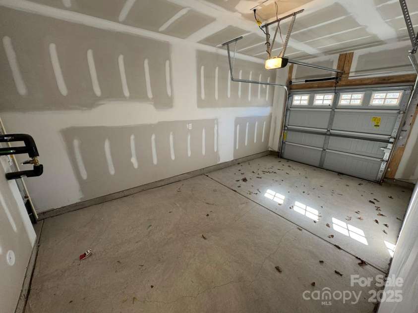 4750 Lakeview Road, Charlotte, NC 28216.  MLS# CAR4261325, YatesRealty ID 2164. Inside rear-load garage