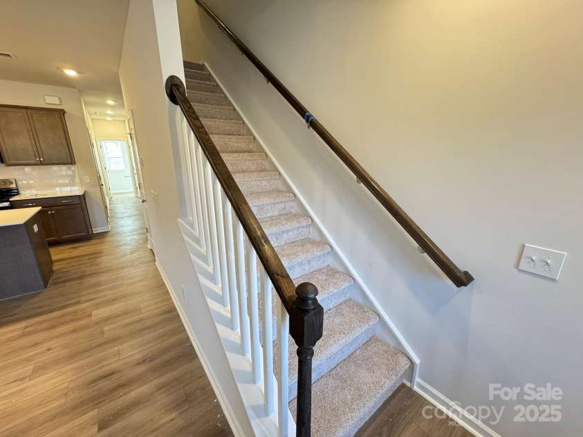 4750 Lakeview Road, Charlotte, NC 28216.  MLS# CAR4261325, YatesRealty ID 2164. Open Balusters at Stairs