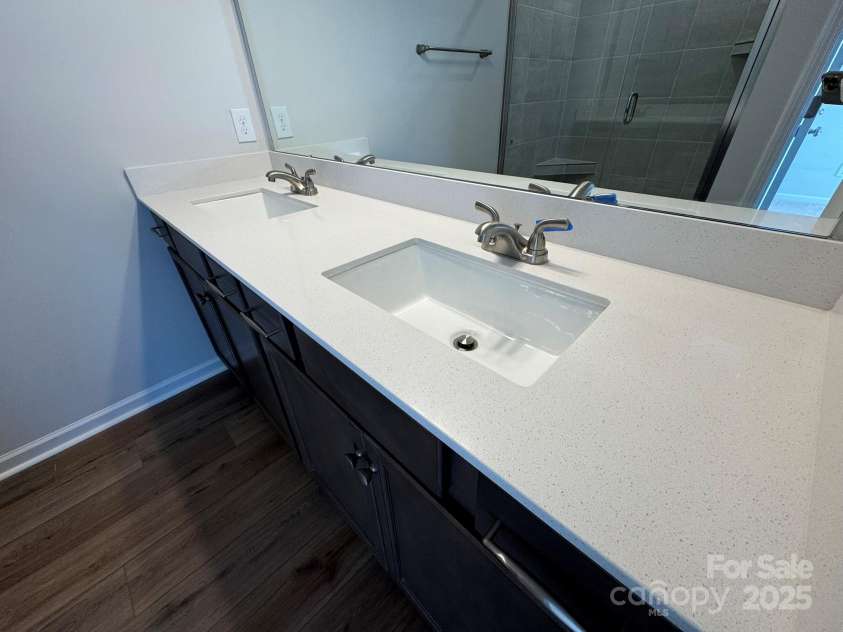 4750 Lakeview Road, Charlotte, NC 28216.  MLS# CAR4261325, YatesRealty ID 2164. Primary Bath Quartz Countertops