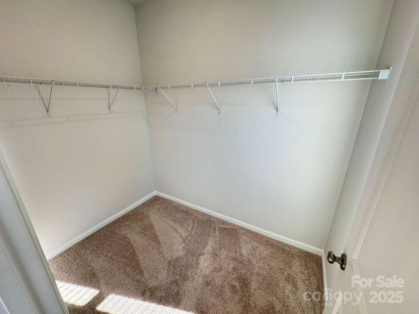 4750 Lakeview Road, Charlotte, NC 28216.  MLS# CAR4261325, YatesRealty ID 2164. Primary closet with window