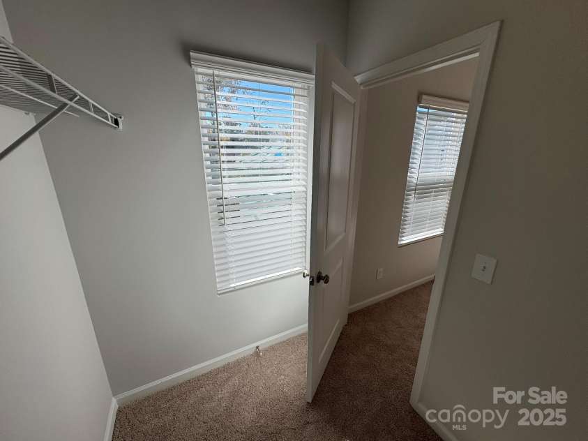 4750 Lakeview Road, Charlotte, NC 28216.  MLS# CAR4261325, YatesRealty ID 2164. Primary Closet with window