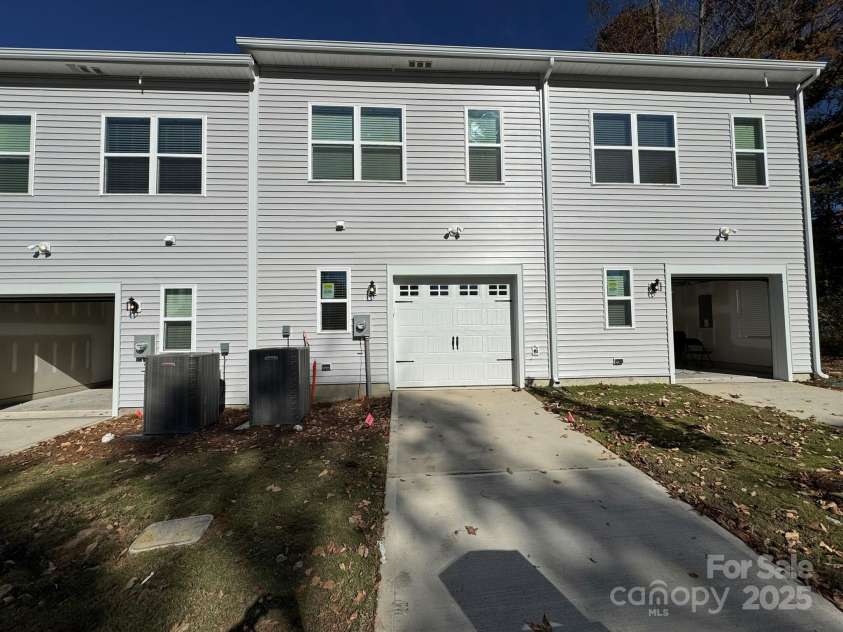 4750 Lakeview Road, Charlotte, NC 28216.  MLS# CAR4261325, YatesRealty ID 2164. Rear load garage