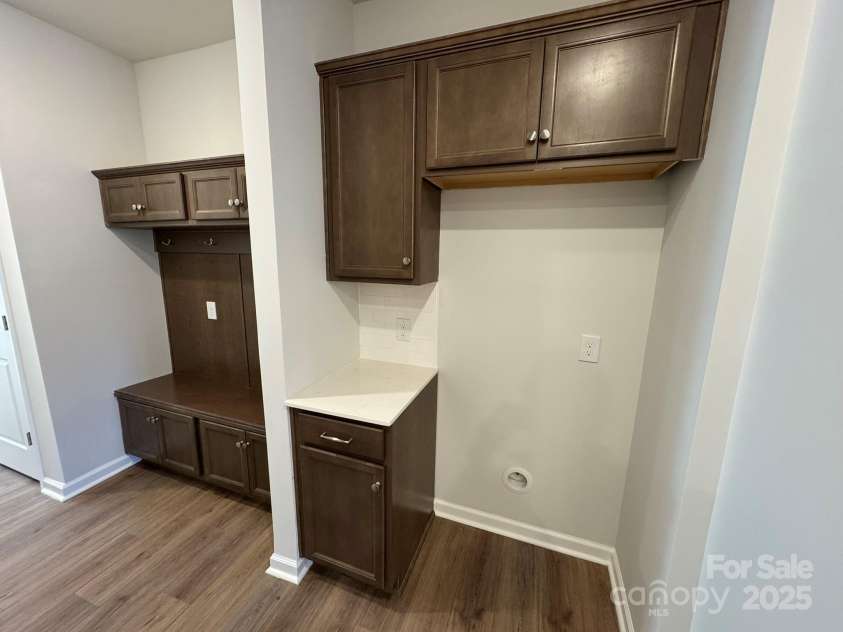 4750 Lakeview Road, Charlotte, NC 28216.  MLS# CAR4261325, YatesRealty ID 2164. Refrigerator area cabinets