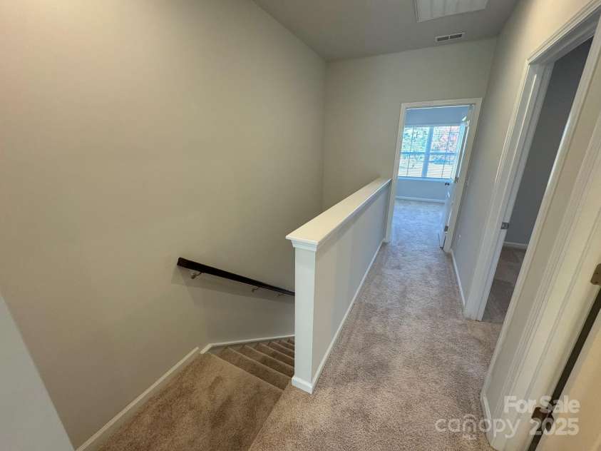 4750 Lakeview Road, Charlotte, NC 28216.  MLS# CAR4261325, YatesRealty ID 2164. Upstairs Hallway