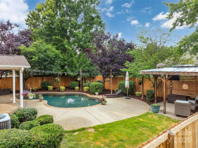 1225 Madison Green Drive, Fort Mill, SC 29715.  MLS# CAR4258843, YatesRealty ID 21640. Backyard