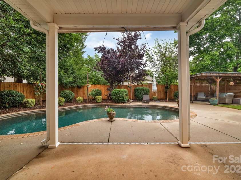 1225 Madison Green Drive, Fort Mill, SC 29715.  MLS# CAR4258843, YatesRealty ID 21640. Covered patio
