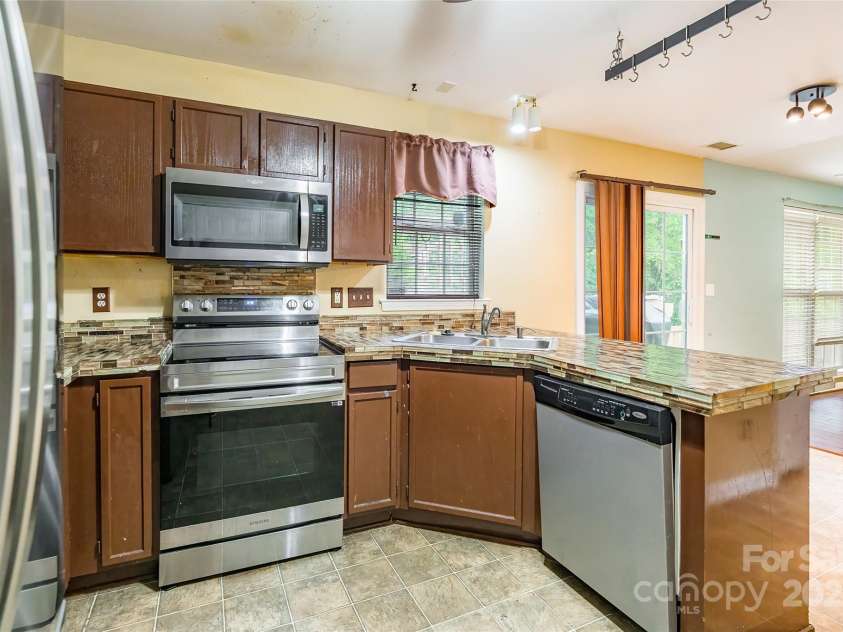 7206 Stoney Place Court, Charlotte, NC 28262.  MLS# CAR4258227, YatesRealty ID 21642. 