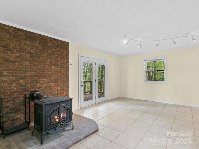 45 Avondale Heights Road, Asheville, NC 28803.  MLS# CAR4270386, YatesRealty ID 21643. Lower level family room