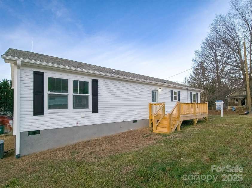 126 Fountain Way, Swannanoa, NC 28778.  MLS# CAR4273601, YatesRealty ID 21647. South facade w/ sunny deck