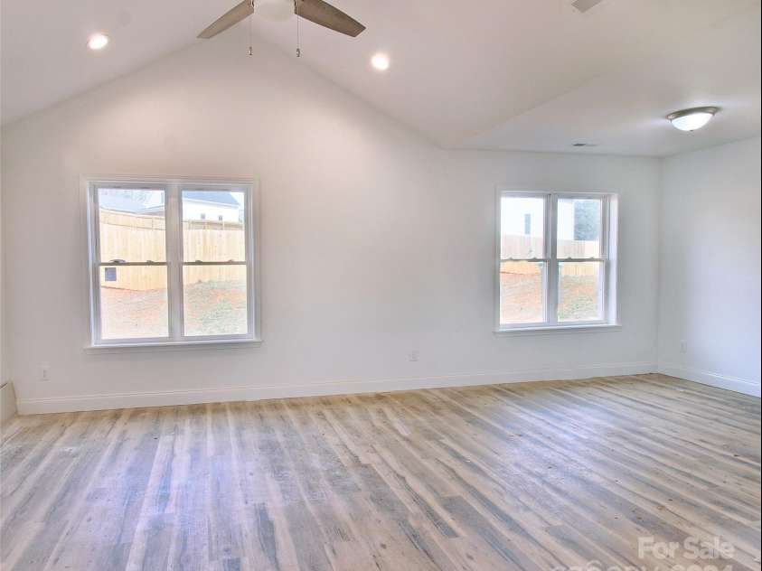 380 Quinn Hill Lane, Mars Hill, NC 28754.  MLS# CAR4127561, YatesRealty ID 2165. Main level living room